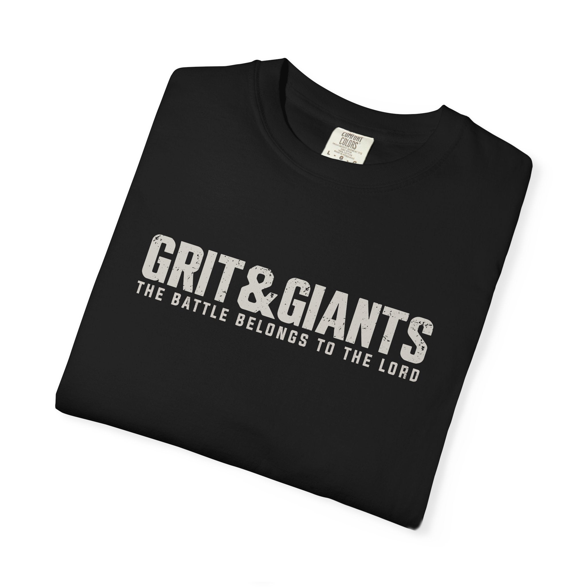 Folded black Grit & Giants Battle Tee featuring The Battle Belongs to the Lord graphic.