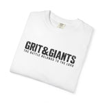 Folded white Grit & Giants Battle Tee featuring The Battle Belongs to the Lord graphic.
