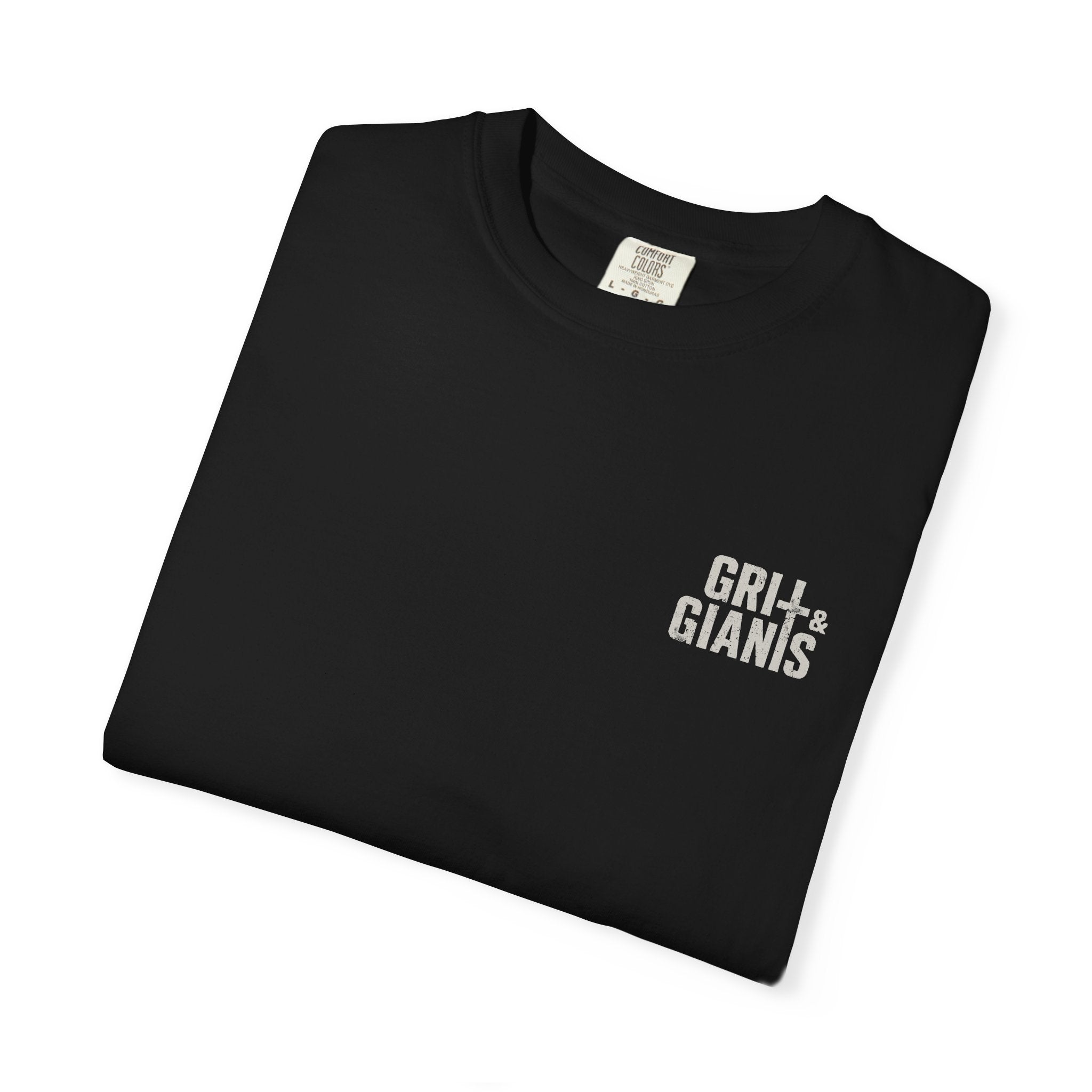 Folded black Grit & Giants Signature Tee featuring the distressed chest logo.