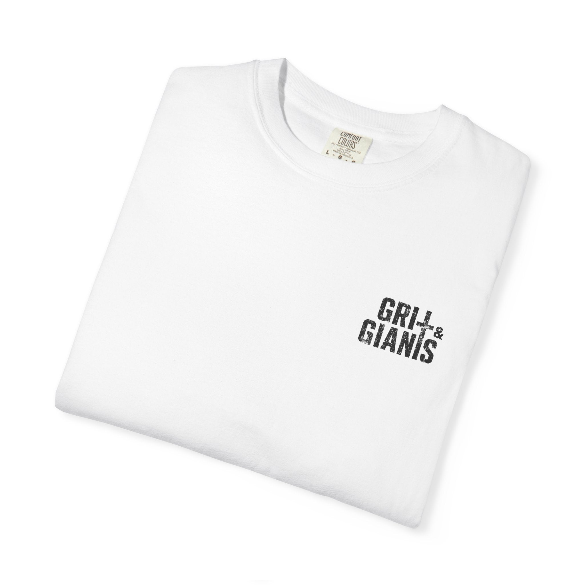 Folded white Grit & Giants Signature Tee featuring the distressed chest logo.
